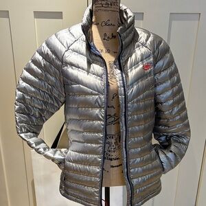 Nike Women’s Metallic Silver Quilted Puffer Jacket with Red Logo